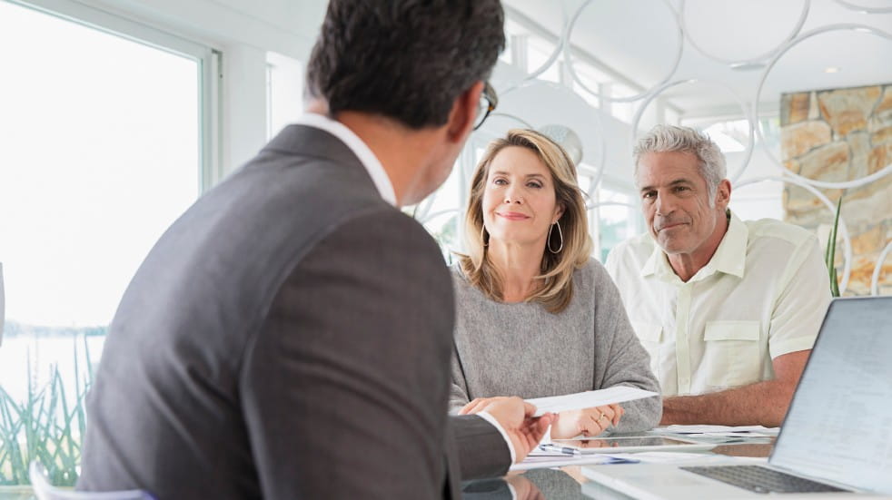 couple with financial advisor